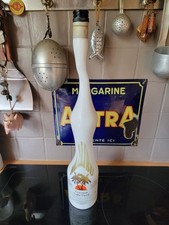 Bouteille malibu déformée d'occasion  Plonéour-Lanvern