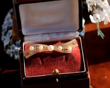 Broche doré noeud d'occasion Broche doré noeud d'occasion  Paris VI