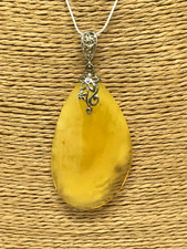 Pendentif ambre cadeau d'occasion  Expédié en France