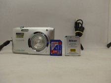 Nikon Coolpix A100, 20.1 MP, carregador USB, SD 1GB, prata--funciona bem comprar usado  Enviando para Brazil