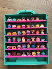 Pacote de bonecos Shopkins x48 com estojo de transporte verde para colecionadores  comprar usado Pacote de bonecos Shopkins x48 com estojo de transporte verde para colecionadores  comprar usado  Enviando para Brazil