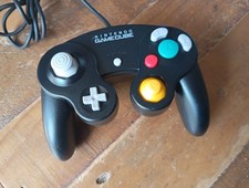 Manette officielle noire d'occasion Manette officielle noire d'occasion  Corbeilles