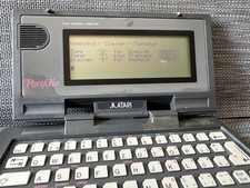 Computadora de bolsillo vintage Atari Portfolio HPC-004 Japón años 80 funcionando MS-DOS segunda mano  Embacar hacia Mexico