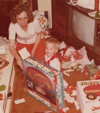 Boy unwrapping gifts for sale  Mission