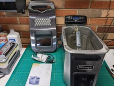 Fritadeira Delonghi Livenza 4,7Qt tampa removível toque frio aço inoxidável 1500W comprar usado Fritadeira Delonghi Livenza 4,7Qt tampa removível toque frio aço inoxidável 1500W comprar usado  Enviando para Brazil