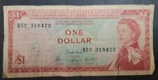 (1965) Estados del Caribe Oriental 1 dólar P13e B52-318472. segunda mano  Embacar hacia Mexico