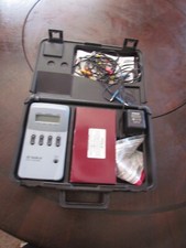 Estimulador de electroterapia RS-4i con cables, almohadillas autoadhesivas, estuche y manual segunda mano  Embacar hacia Mexico