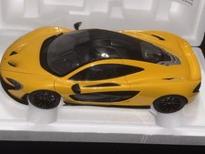 Carro modelo amarelo vulcão Mclaren P1 escala 1/12 por AUTOart comprar usado  Enviando para Brazil