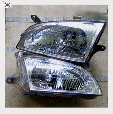 Kia carens1 headlight d'occasion  Expédié en Belgium