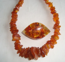 Collier broche ambre d'occasion  France