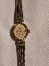 Montre femme dorée d'occasion  Paris XI