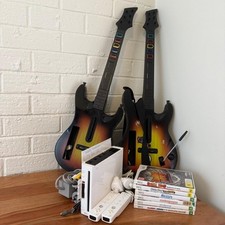 Pacote de console Wii guitarras Guitar Hero + jogos + controles + cabos - Testado comprar usado  Enviando para Brazil