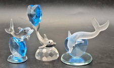 Set dolphin figurines for sale  LEEDS