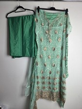 Green unstitched material for sale  DAGENHAM