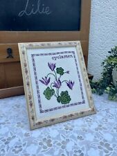 Tableau broderie cyclamen d'occasion  Le Grand-Lucé