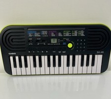 Mini teclado eletrônico CASIO SA-46 32 teclas preto/verde 100 tons 50 padrões comprar usado  Enviando para Brazil