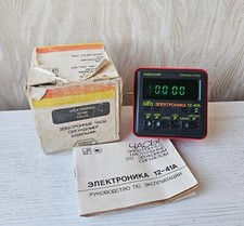 Relógio despertador de mesa display VFD ELEKTRONIKA 12 ALFA funciona bem da URSS ERA 1989 comprar usado  Enviando para Brazil