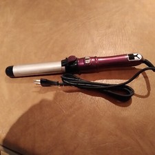 Fer cheveux rotatif d'occasion  Aubevoye