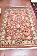 Tappeto rosso beige usato  Susegana