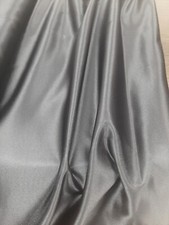 Tessuto raso nero usato Tessuto raso nero usato  Pulsano