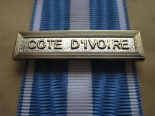 Agrafe côte ivoire d'occasion  Conches-en-Ouche