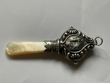 Mordedor e chocalho de prata esterlina e esfregão para bebês. comprar usado  Enviando para Brazil
