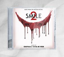 Smile 2 (2024) Music From The Motion Picture 1CD Cristobal Tapia De Veer comprar usado Smile 2 (2024) Music From The Motion Picture 1CD Cristobal Tapia De Veer comprar usado  Enviando para Brazil