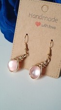 Orecchini intrecciati rosa usato  Trento
