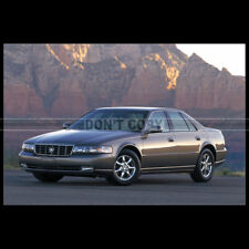Photo .033585 cadillac d'occasion  Martinvast