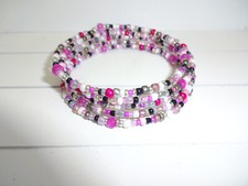 Spiralarmreif pink schwarz gebraucht kaufen  Alsfeld