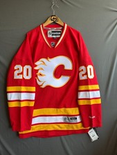 Camiseta Reebok Calgary Flames masculina XXL vermelha Reto Berra 20 NHL esportes de hóquei NOS comprar usado  Enviando para Brazil