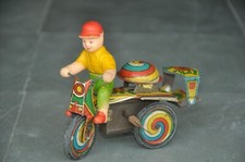 Brinquedo litho vintage de estanho e celulóide enrolar menino montando triciclo, colecionável comprar usado  Enviando para Brazil