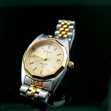 Relógio de pulso feminino Bulova Merrill Lynch estrela marinha tom prata dourado com data comprar usado  Enviando para Brazil