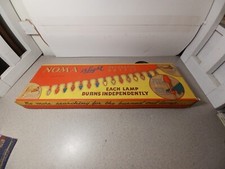 Roupa decorativa leve década de 1950 NOMA 15 na caixa original parcialmente luzes funcionando comprar usado  Enviando para Brazil