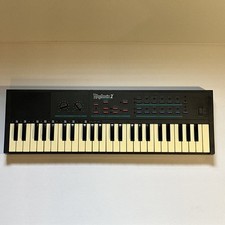 Teclado vintage 1986 Rhythmic 2 49 teclas sintetizador probado y funcionando segunda mano  Embacar hacia Mexico