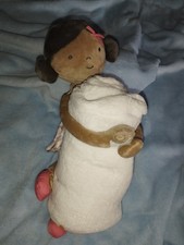Doudou poupée métisse d'occasion  Avion