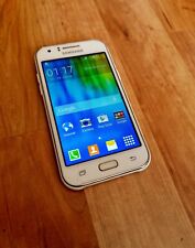 Samsung Galaxy J1 Modell SM-J100H in arctic-white ( defekt ), usado comprar usado  Enviando para Brazil