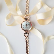 Montre bracelet femme d'occasion  Saint-Symphorien-d'Ozon