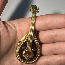 Broche mandoline dorée d'occasion  Andernos-les-Bains