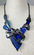 Blue geometric bib for sale  RAMSGATE