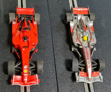 Usado, MODELOS DE CORRIDA SLOT CARS SCX 1X FERRARI SCHUMACHER & 1X McLAREN HAMILTON F1 em escala 1/43 comprar usado  Enviando para Brazil