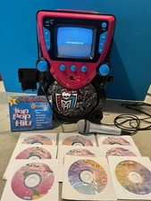 Sistema de karaokê Monster High teleprompter e microfone com 11 CDs de karaokê. ” comprar usado  Enviando para Brazil