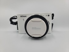 Usado, Câmera Digital Nikon 1 J1 Sem Espelho Nikkor 10-30mm Lente 3.5-5.6 Branca Funcionando comprar usado Usado, Câmera Digital Nikon 1 J1 Sem Espelho Nikkor 10-30mm Lente 3.5-5.6 Branca Funcionando comprar usado  Enviando para Brazil