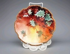 Usado, Limoges 9 1/2” HP. Prato de bolo Holly Berry com fundo vermelho e amarelo - assinado comprar usado  Enviando para Brazil