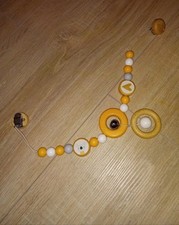 Kinderwagenkette holz gelb gebraucht kaufen  Neumünster