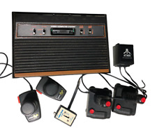 Atari 2600 original com 2 joysticks, 2 controles de remo e 18 jogos comprar usado  Enviando para Brazil