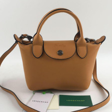 Longchamp pliage cuir d'occasion  Expédié en Belgium