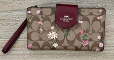 Carteira de pulso Coach marrom florida média com suporte para celular - sem reserva!!! comprar usado  Enviando para Brazil