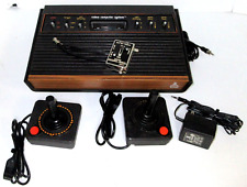 Console Atari 2600 não funciona cabo de alimentação, interruptor de RF e 2 controle de joysticks Atari comprar usado  Enviando para Brazil