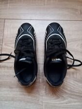 Chaussures foot noires d'occasion  Vouillé